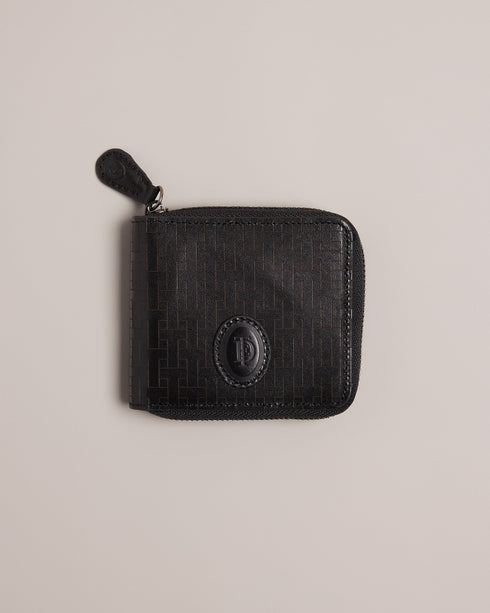 TOBIAT-Wallets-Take your style from casual to elevated with TOBIAT. With a zip-around fastening, inside pocket and multiple card slots, you’ll be able to hold on to all your essentials with ease.By purchasing this product, you are supporting responsible leather manufacturing through the Leather Working Group. Wallet Leather T monogram texture Zip around fastening Card slots Inside pocket Ted Baker branded embellishment Dimensions: 2cm x 9cm x 11cm- Ted Baker Romania