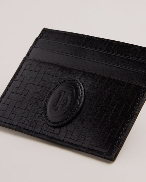 TOBIES-Wallets-The TOBIES card holder is both classic and elevated. The lined interior will keep your cards safe, while the house check texture looks sharp from the bar to the office.By purchasing this product, you are supporting responsible leather manufacturing through the Leather Working Group. Card holder Leather House check texture Lined Ted Baker branded Dimensions: 0.5cm x 7.8cm x 10cm- Ted Baker Romania