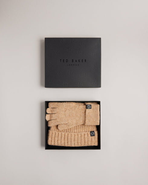 BRITE-Gifts-Give the gift of snug winter mornings with the BRITE Hat and Gloves Set. A soft wool blend and ribbed knit bring a new level of warmth to crisp dog walks and wintery school runs. Hat and gloves set Wool blend Ribbed knit Ted Baker branded Comes in Ted Baker branded gift box- Ted Baker Romania