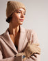 BRITE-Gifts-Give the gift of snug winter mornings with the BRITE Hat and Gloves Set. A soft wool blend and ribbed knit bring a new level of warmth to crisp dog walks and wintery school runs. Hat and gloves set Wool blend Ribbed knit Ted Baker branded Comes in Ted Baker branded gift box- Ted Baker Romania