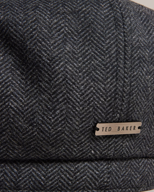 OLLIII-Hats-Indulge in the simplicity of a classic hat that's sure to become your go-to. In a timeless baker boy style, OLLIII provides a suave finishing touch to your everyday style. Baker boy hat Wool blend Chevron texture Ted Baker branded- Ted Baker Romania