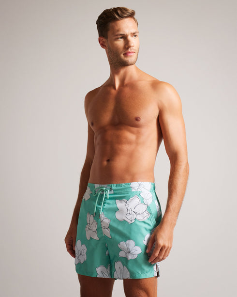 AMPBELL-Swimwear-Make a splash this summer with our vibrant AMPBELL Swim Shorts. Their playful floral print adds a pop of color while the drawstring waistband and pockets provide both comfort and practicality. The shell fabric of this product is made of 100% recycled polyester. Using recycled polyester helps divert plastic waste from ending in landfills and helps us to reduce our dependence on virgin materials. Swim shorts Floral print Pockets Drawstring waistband Lined- Ted Baker Romania