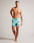 AMPBELL-Swimwear-Make a splash this summer with our vibrant AMPBELL Swim Shorts. Their playful floral print adds a pop of color while the drawstring waistband and pockets provide both comfort and practicality. The shell fabric of this product is made of 100% recycled polyester. Using recycled polyester helps divert plastic waste from ending in landfills and helps us to reduce our dependence on virgin materials. Swim shorts Floral print Pockets Drawstring waistband Lined- Ted Baker Romania