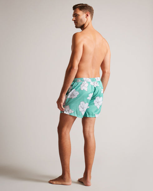 AMPBELL-Swimwear-Make a splash this summer with our vibrant AMPBELL Swim Shorts. Their playful floral print adds a pop of color while the drawstring waistband and pockets provide both comfort and practicality. The shell fabric of this product is made of 100% recycled polyester. Using recycled polyester helps divert plastic waste from ending in landfills and helps us to reduce our dependence on virgin materials. Swim shorts Floral print Pockets Drawstring waistband Lined- Ted Baker Romania