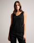 SHAVON-Tops-Step up your casual style with this must-have slouchy vest. SHAVON's V-neck and low back provide a comfortable, relaxed fit, while the sleeveless design makes it perfect for layering. The eye-catching embroidered magnolia and contrast stitching add a touch of charm, and the stretch fabric promises all-day comfort. Slouchy vest Rounded V-neck Low back Sleeveless Embroidered magnolia Stretch fabric Contrast stitching Amy is 5'9.5" / 1.77m and wears Black in a Ted size 1- Ted Baker Romania