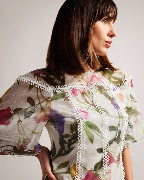 ARELLN-Tops-Our ARELLN top is a lovely addition to your new season wardrobe. Wide short sleeves and lace give it a vintage feel, while the scattered bouquet print is sure to get you noticed. Mesh top Lined Scattered bouquet print High neck Scalloped lace trims Wide short sleeves Button fastening with keyhole cut-out Julia is 5'10" / 1.78m and wears White in a Ted size 1- Ted Baker Romania