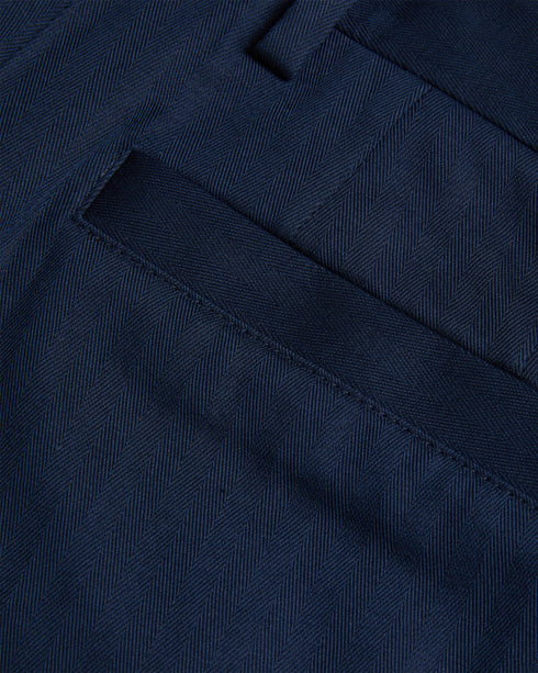 SHAKERT-Trousers-Step up your style with these slim fit trousers featuring a subtle herringbone texture. Made from a comfortable cotton and linen blend, SHAKERT are perfect for any smart occasion. A sleek zip and hook fastening make for a perfectly tailored finish.By choosing Ted Baker cotton products, you're supporting our investment in the Better Cotton Initiative's mission. This product is sourced via a system of mass balance and therefore may not contain Better Cotton. Trousers Slim fit Herringbone text