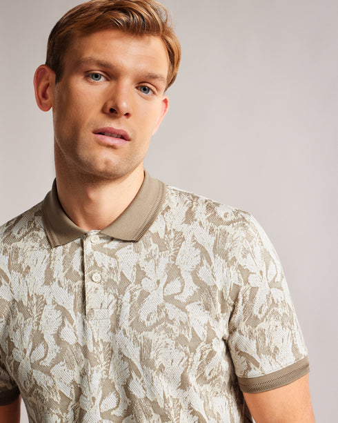 PLASTA-Tops-Take it easy in this super soft polo shirt. PLASTA has a comfortable fit and a classic silhouette that's always in style.By choosing Ted Baker cotton products, you're supporting our investment in the Better Cotton Initiative's mission. This product is sourced via a system of mass balance and therefore may not contain Better Cotton. Polo shirt Short sleeved Floral print Solid trims Button fastening Classic collar Elliot is 6'2" / 1.88m and wears Stone in a Ted size 3- Ted Baker Romania