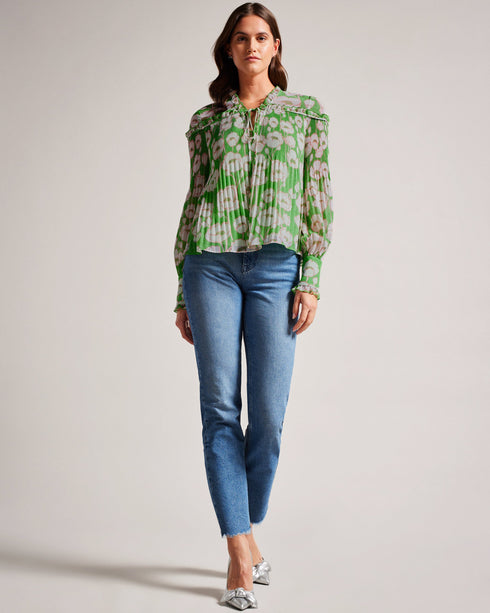 ELLERIE-Tops-Introducing our stunning ELLERIE blouse, featuring a gorgeous poppy print that will add a touch of classic femininity to your wardrobe. A pleated fabric adorned with our exclusive poppy print will brighten up your wardrobe for both casual and dressy occasions. Blouse Poppy print Long blouson sleeves Pleated texture Ruffled V-neck Tie front Boxy fit Amy is 5'9.5" / 1.77m and wears Green in a Ted size 1- Ted Baker Romania