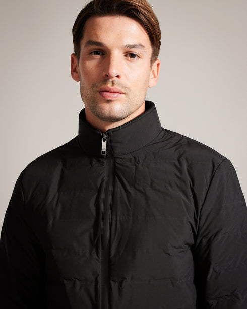 TUCSON-Outerwear-Unpredictable weather has nothing on you. With a trendy horizontal quilt, the TUCSON jacket has you covered through rainy days and brisk mornings alike. Puffer jacket Slim horizontal quilt Long sleeved Zip fastening High neck Zip pockets- Ted Baker Romania