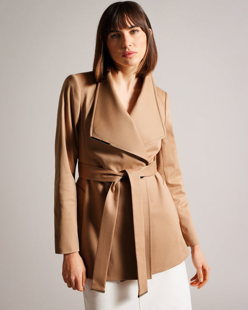 ROSIAAS-Outerwear-Stay chic in any weather with our ROSIAAS coat. Made of a cosy cotton blend, it features a wrap front and self-tie belt, accented by a metal hardware trim. Perfect for navigating the city streets or braving the rain, this trench is both practical and fashionable. By choosing Ted Baker cotton products, you're supporting our investment in the Better Cotton Initiative's mission. This product is sourced via a system of mass balance and therefore may not contain Better Cotton. Trench coat Mini