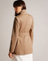 ROSIAAS-Outerwear-Stay chic in any weather with our ROSIAAS coat. Made of a cosy cotton blend, it features a wrap front and self-tie belt, accented by a metal hardware trim. Perfect for navigating the city streets or braving the rain, this trench is both practical and fashionable. By choosing Ted Baker cotton products, you're supporting our investment in the Better Cotton Initiative's mission. This product is sourced via a system of mass balance and therefore may not contain Better Cotton. Trench coat Mini
