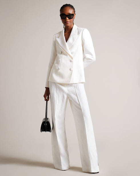 ASTAA-Jackets-Elevate your formal wardrobe with the sophisticated ASTAA tuxedo jacket, crafted from a luxurious linen blend for a lightweight and breathable feel. Its oversized lapel brings a modern twist to the look for when you're dressing to impress. Tuxedo jacket Linen blend Double breasted buttons Oversized peaked lapel Long sleeved Ayo is 5'8" / 1.73m and wears Cream in a Ted size 1- Ted Baker Romania