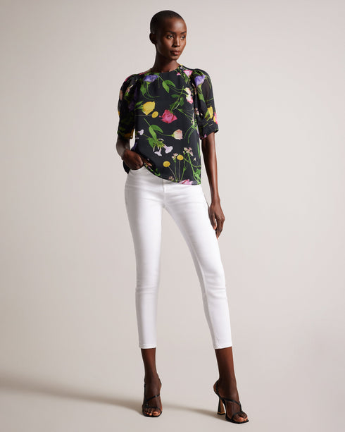 PHOEBIA-Tops-Make a statement with this beautiful and feminine boxy top. PHOEBIA's scattered bouquet floral print, short puff sleeves, and oversized self-tie back create an eye-catching silhouette. Crafted from textured fabric with a crew neck, it's perfect for a day out or a special occasion.The fabric of this product is made with 100% recycled polyester. Using recycled polyester helps divert plastic waste from ending in landfills, and helps us to reduce our dependence on virgin materials. Boxy top Scatter