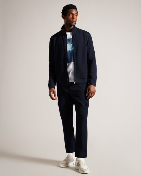 PHLOEM-Tops-With a full zip through fastening and a classic funnel neck, PHLOEM is not only practical but a great choice for layering, too. Made from 100% cotton, its long sleeves and regular fit provide a timeless silhouette, while the simple yet modern design will keep you looking sharp no matter the occasion. Jacket Full zip through fastening Funnel neck 100% cotton Long sleeved Regular fit Halid is 6'2" / 1.88m and wears Navy in a Ted size 3- Ted Baker Romania