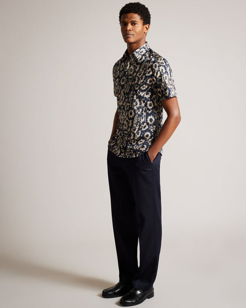 AIBSHO-Shirts-Let your style bloom in AIBSHO. Featuring a playful floral print and classic collar, this slim-fit shirt is crafted from a comfortable cotton blend that will keep you feeling fresh all day long.By choosing Ted Baker cotton products, you're supporting our investment in the Better Cotton Initiative's mission. This product is sourced via a system of mass balance and therefore may not contain Better Cotton. Button up shirt Cotton blend Short sleeved Floral print Classic collar Slim fit O'Shea is 6