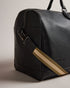 KALVIN-Bags-The ultimate in travel accessories, the sleek KALVIN holdall is roomy enough to pack your essentials—and then some—for a weekend away. An adjustable webbing shoulder strap ensures comfortable carrying. Holdall bag Faux leather Two top handles Webbing shoulder strap Zip fastening Logo detail Dimensions: 22cm x 28cm x 52cm- Ted Baker Romania
