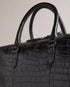 FABIANN-Bags-The FABIANN document bag blends style and functionality with effortless finesse. Inside, you'll find a padded pocket designed to fit a 15" laptop and a trolley slip that makes it the ideal travel companion for business trips and beyond. Document bag Croc effect leather Removable twill shoulder strap Two top handles Zip fastening Ted Baker logo Trolley slip Padded pocket fits 15" laptop Dimensions: 40cm x 8cm x 28cm- Ted Baker Romania