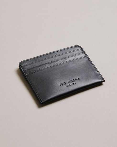 HACE-Wallets-Add a touch of luxury to your daily routine with our leather HACE card holder. The branded stud and rounded top edges enhance its visual appeal, while multiple card slots offer ample space for your essentials. Card holder Top grain leather Branded stud Rounded top edges Debossed logo Card slots Dimensions: 0.5cm x 7.8cm x 10cm- Ted Baker Romania