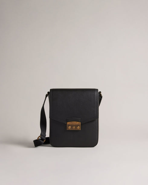 KALVON-Bags-Travel in style with KALVON. With an adjustable shoulder strap and top-grain leather construction, this mini flight bag keeps your essentials close at hand so you can travel with ease. Flight bag Top grain leather Flap cover Trunk lock hardware Adjustable shoulder strap Logo detail- Ted Baker Romania