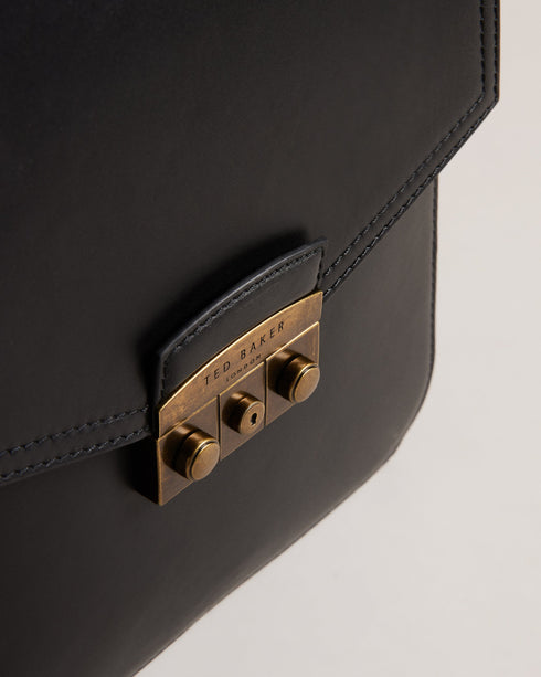 KALVON-Bags-Travel in style with KALVON. With an adjustable shoulder strap and top-grain leather construction, this mini flight bag keeps your essentials close at hand so you can travel with ease. Flight bag Top grain leather Flap cover Trunk lock hardware Adjustable shoulder strap Logo detail- Ted Baker Romania