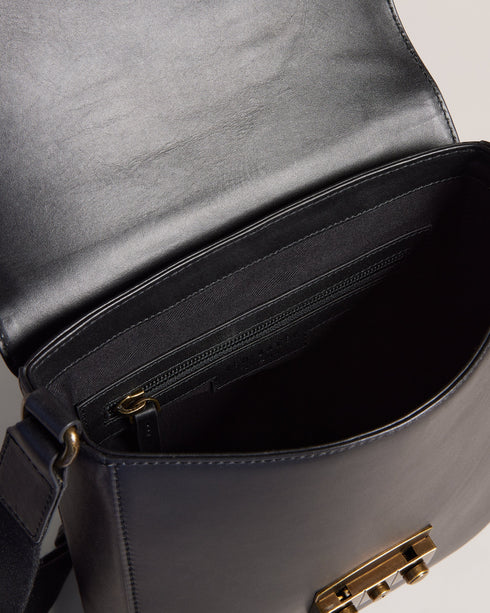 KALVON-Bags-Travel in style with KALVON. With an adjustable shoulder strap and top-grain leather construction, this mini flight bag keeps your essentials close at hand so you can travel with ease. Flight bag Top grain leather Flap cover Trunk lock hardware Adjustable shoulder strap Logo detail- Ted Baker Romania