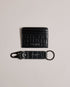 ROMAIIN-Gifts-Keep your keys and cards organized with our ROMAIIN set. Made from high-quality leather featuring a sophisticated croc texture, these accessories are the epitome of understated luxury. With a glossy finish that catches the eye, this set not only keeps your essentials in check but also adds a stylish edge to your everyday carry. Key fob and card holder set Leather Croc texture Hinge clip Logo detail Glossy finish- Ted Baker Romania