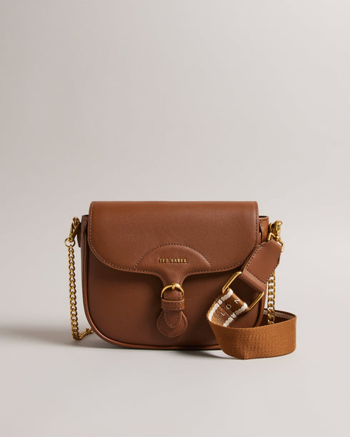ESIA-Bags-Effortless glamour, meet ESIA. This saddle bag is crafted from luxurious leather, and you can keep even more essentials close at hand with the convenient back slip pocket. For a personalised touch, the removable branded webbing strap allows you to switch up your look effortlessly. Leather crossbody saddle bag Magnetic fastening with buckle tab Chain shoulder strap with padded leather panel Removable branded webbing strap Logo hardware Back slip pocket Dimensions: 5cm x 16.5cm x 21cm- Ted Baker Rom