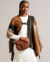 ESIA-Bags-Effortless glamour, meet ESIA. This saddle bag is crafted from luxurious leather, and you can keep even more essentials close at hand with the convenient back slip pocket. For a personalised touch, the removable branded webbing strap allows you to switch up your look effortlessly. Leather crossbody saddle bag Magnetic fastening with buckle tab Chain shoulder strap with padded leather panel Removable branded webbing strap Logo hardware Back slip pocket Dimensions: 5cm x 16.5cm x 21cm- Ted Baker Rom