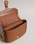 ESIA-Bags-Effortless glamour, meet ESIA. This saddle bag is crafted from luxurious leather, and you can keep even more essentials close at hand with the convenient back slip pocket. For a personalised touch, the removable branded webbing strap allows you to switch up your look effortlessly. Leather crossbody saddle bag Magnetic fastening with buckle tab Chain shoulder strap with padded leather panel Removable branded webbing strap Logo hardware Back slip pocket Dimensions: 5cm x 16.5cm x 21cm- Ted Baker Rom