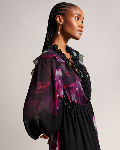 GIONNNA-Dresses-GIONNNA is all about the floaty silhouette. With a deep V-neck adorned with flowers, it's just the right amount of flirty and feminine. Whether you're attending a garden wedding or a summer soiree, this maxi dress is a stunning choice. Maxi dress Floaty silhouette Embroidered flowers on neckline Deep V-neck Fitted waist Blouson sleeve Frill details Effortless eleganceAn enchanting floaty silhouette and blouson sleeves offer a relaxed silhouette and capture the essence of timeless style.Whims