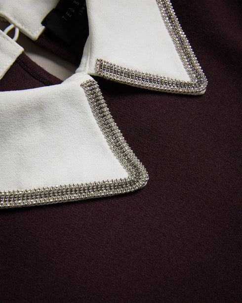 PENNIII-Knitwear-Your new favourite jumper, PENNIII has all the comfort with a little added charm, thanks to its embellished shirt collar. Pair with your favourite jeans to spruce up your casual outfits.This product is made using LENZING™ ECOVERO™ Viscose fibers. LENZING™ ECOVERO™ fibers are derived from sustainable wood and pulp, sourced from certified and controlled forests, with up to 50% lower emissions and water impact compared to generic viscose. LENZING™ and ECOVERO™ is a trademark of Lenzing AG. Jum