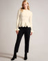HAZALEN-Knitwear-Upgrade your knit drawer with the HAZALEN top. Its long fluted sleeves add a touch of drama to your every gesture, while a crew neck keeps things timeless and versatile. Knitted top Long fluted sleeves Crew neck Scalloped edge Peplum waist Stretch fabric- Ted Baker Romania
