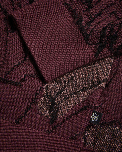 SIMPSO-Knitwear-Crafted from a luxurious wool blend, SIMPSO provides the ideal balance of warmth and style for chilly days. A sketchy floral design brightens up your wardrobe and its classic silhouette can be paired with anything. Jumper Sketchy floral design Wool blend Long sleeves Crew neck Ribbed trims O'Shea is 6'2.5" / 1.89m and wears Maroon in a Ted size 3- Ted Baker Romania