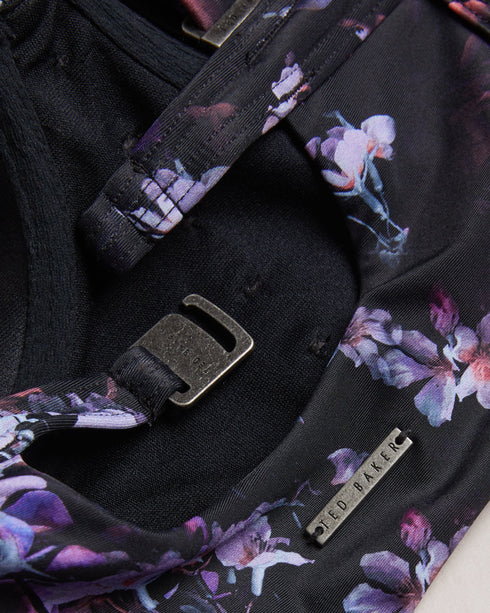 AJANTAH-Swimwear-Featuring a floral print and decorative button front, the AJANTAH bikini top boasts a flattering silhouette that's sure to turn heads. The back cut-out and adjustable straps offer comfort and versatility for all your coastal adventures. Longline bikini top Balconette cups Floral print Decorative buttons Contrast piping Adjustable straps Hook fastening Back cut-out Metal branded plaque- Ted Baker Romania