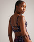 AJANTAH-Swimwear-Featuring a floral print and decorative button front, the AJANTAH bikini top boasts a flattering silhouette that's sure to turn heads. The back cut-out and adjustable straps offer comfort and versatility for all your coastal adventures. Longline bikini top Balconette cups Floral print Decorative buttons Contrast piping Adjustable straps Hook fastening Back cut-out Metal branded plaque- Ted Baker Romania