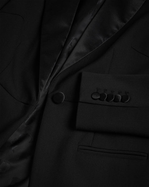 ARIAAL-Jackets-The sophisticated ARIAAL blazer adds a touch of luxury to your outfit. With its satin lapel and impeccable tailoring, this blazer is a statement of timeless fashion. Don't mind if we do. Tuxedo style blazer Satin peaked lapel Button fastening Pockets Long sleeves Jara is 5'10.5" / 1.79m and wears Black in a Ted size 1- Ted Baker Romania