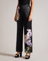 NAYAAT-Trousers-Embrace a bold and sophisticated style with our NAYAAT satin trousers. Featuring a captivating photographic floral print, these trousers effortlessly blend artistry and fashion. Their wide leg silhouette exudes an air of modern elegance, while the high waist and side pockets add practicality to the design. Satin trousers Photographic floral print Wide leg High waisted Belt loops Pockets Leg crease Matching jacket: NAYAA- Ted Baker Romania