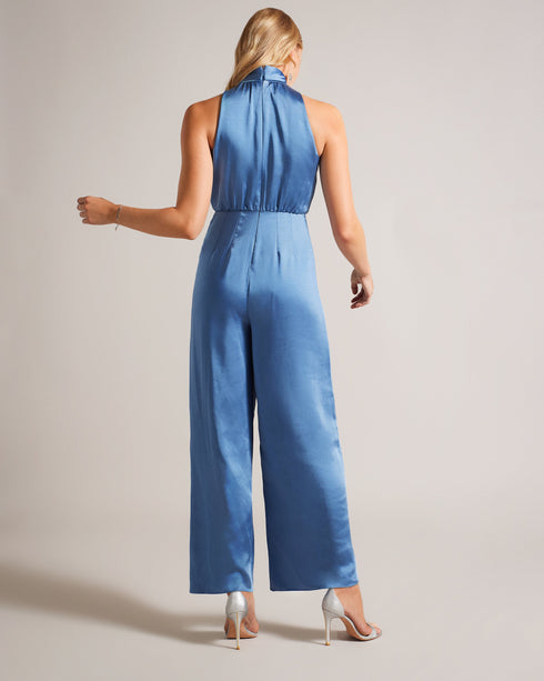 AMBRIAA-Trousers-Make an unforgettable entrance with AMBRIAA. This satin jumpsuit exudes sophistication, featuring a graceful pussybow neck tie and elegant wide legs. A convenient zip fastening ensures effortless wear, making it a must-have for any special occasion. Satin jumpsuit High neck Pussybow neck tie Wide leg Zip fastening Jara is 5'10.5" / 1.79m and wears Blue in a Ted size 1- Ted Baker Romania