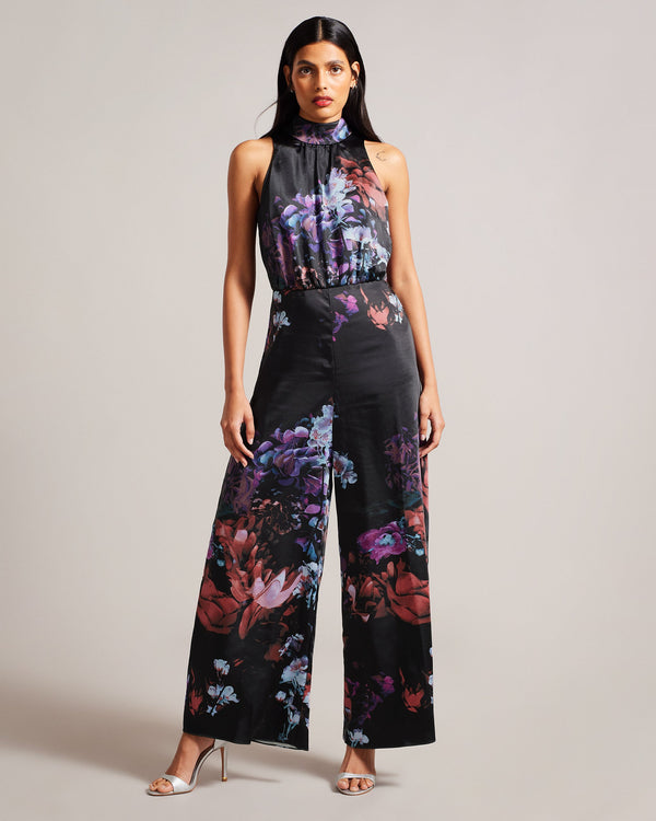 MARLEEH-Trousers-Dress to impress in MARLEEH. Featuring an oversized neck tie and a fitted waist, this sleeveless jumpsuit offers a sophisticated and flattering fit. Satin jumpsuit Floral print Wide leg Sleeveless Oversized neck tie Stand collar Fitted waist Zip fastening Samruddhi is 5'7" / 1.71m and wears Black in a Ted size 1- Ted Baker Romania