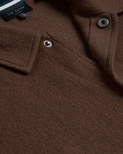 EASON-Knitwear-Meet EASON, a classic wool jacket with a touch of modernity. Featuring a sleek popper fastening and practical pockets, this jacket is a must-have for any fashion-savvy wardrobe. Jacket 100% wool Popper fastening Classic collar Pockets- Ted Baker Romania