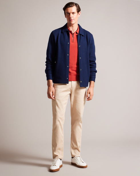 EASON-Knitwear-Meet EASON, a classic wool jacket with a touch of modernity. Featuring a sleek popper fastening and practical pockets, this jacket is a must-have for any fashion-savvy wardrobe. Jacket 100% wool Popper fastening Classic collar Pockets- Ted Baker Romania