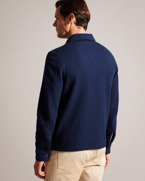 EASON-Knitwear-Meet EASON, a classic wool jacket with a touch of modernity. Featuring a sleek popper fastening and practical pockets, this jacket is a must-have for any fashion-savvy wardrobe. Jacket 100% wool Popper fastening Classic collar Pockets- Ted Baker Romania