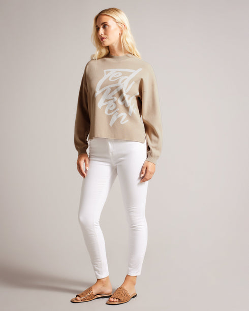 EMALLLY-Knitwear-EMALLLY is designed for ultimate comfort and effortless style. With its relaxed fit, this jumper is perfect for laid-back days. Complete with a classic crew neck and raw hem, this versatile jumper can be easily paired with your favorite jeans or leggings. Jumper Relaxed fit Jacquard logo Split raw hem Crew neck Long sleeves Elvira is 5'9" / 1.75m and wears Camel in a Ted size 1- Ted Baker Romania