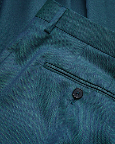 NORTHT-Trousers-With a pure Italian wool tonic and a sleek slim fit, NORTHT are pure sophistication. The front crease adds a subtle tailored edge to these trousers. Trousers Slim fit Pure Italian wool tonic Front crease Zip fastening with hook and bar Pockets Matching jacket: NORTHJ- Ted Baker Romania