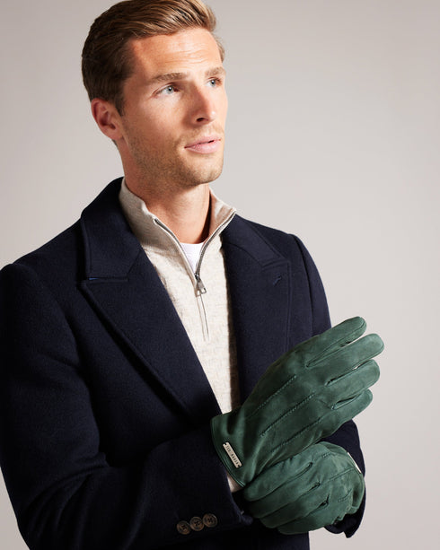 LEVIII-Gloves-Our LEVIII gloves are the ultimate fusion of style and functionality. Crafted from luxurious nubuck and suede leather, they're touch screen compatible so you can stay connected in style. Braided seam detailing and a metal branded plaque add a touch of sophistication to your winter wardrobe. Gloves Nubuck and suede leather Touch screen compatible Braided seam detailing Metal branded plaque- Ted Baker Romania