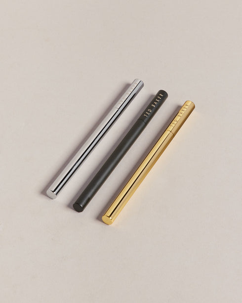 KRISII-Gifts-Give the gift of simple sophistication with KRISII. Whether you're treating a loved one or upping your own writing game, these stainless steel pens leave a lasting impression. Three pack of pens Ballpoint with black ink Stainless steel Assorted colours Engraved logo Comes in gift box- Ted Baker Romania