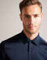 CORATO-Shirts-CORATO is a year-round go-to that's built for comfort and style. It's the perfect foundation piece for any ensemble, with a glossy sheen and classic button fastening. Button up shirt Long sleeves Classic collar Modal blend Lustrous finish Slim fit Tobias is 6'1" / 1.86m and wears Black in a Ted size 3- Ted Baker Romania