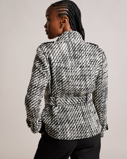 ROSEBY-Jackets-Meet ROSEBY: a biker jacket that reimagines the timeless style. This piece beautifully marries the iconic biker silhouette with a touch of glamour, thanks to its intricate boucle knit. Boucle biker jacket Wrap front Matching belt Asymmetric zip fastening Zip pockets Ayo is 5'8" / 1.73m and wears Black in a Ted size 1- Ted Baker Romania