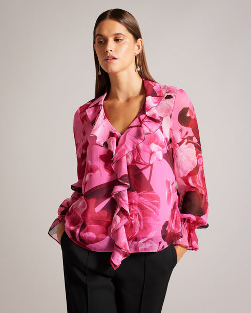 LUUCIIE-Tops-Let your stye bloom with the LUUCIIE blouse. With a flattering V-neckline and elegant sleeves, this blouse is perfect for both casual and dressy occasions. Flared cuffs add a playful detail to complete the look. Blouse Abstract floral print Ruffled front Metal ball trim V-neck Long sleeves Flared cuffs- Ted Baker Romania